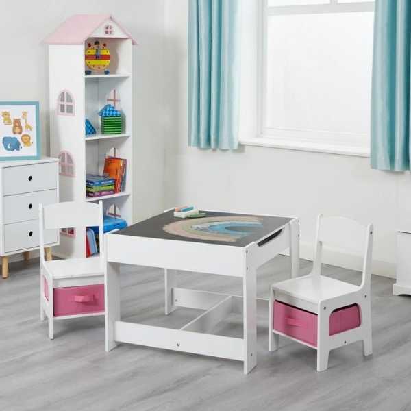 White table and chairs with pink storage bins