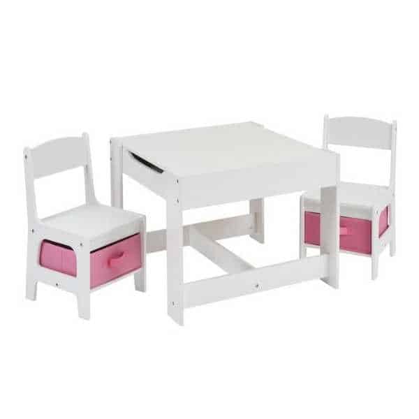 White table and chairs with pink storage bins