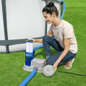 Filter Cartridge Being Placed into Pool Filter Buying an above ground pool